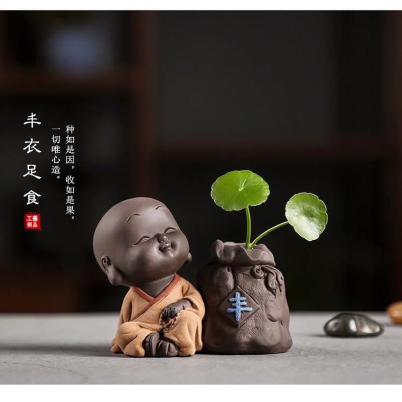 bộ tượng chú tiểu trồng cây hút tài lộc