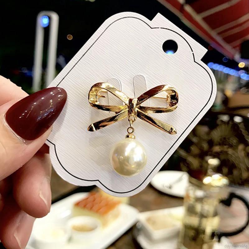 Ghim cài áo hình nơ đính ngọc trai thời trang