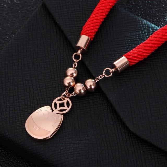 Vòng tay titan dây đỏ mèo