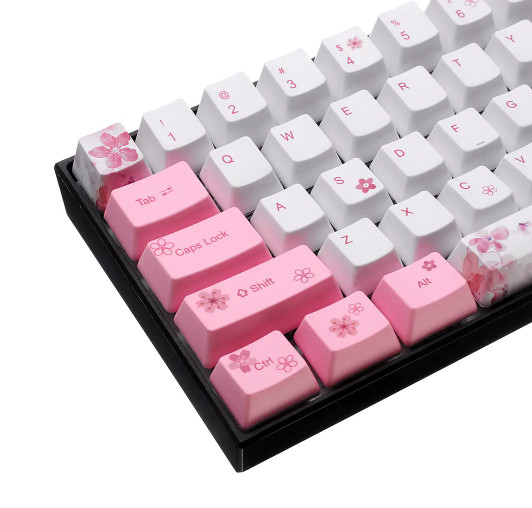 Bộ Keycap (mũ phím) PBT 61 phím – Chính hãng Royal Kludge. Hoạ tiết Sakura - Hoa anh đào. Công nghệ in Dye – sub, bền đẹp. Dành cho bàn phím cơ 61 phím. OEM Profile.