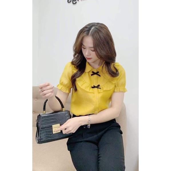 Áo sơ mi nữ công sở thời trang SURI lụa màu vàng,tay ngắn đính nơ đen ngực-VANGNODEN