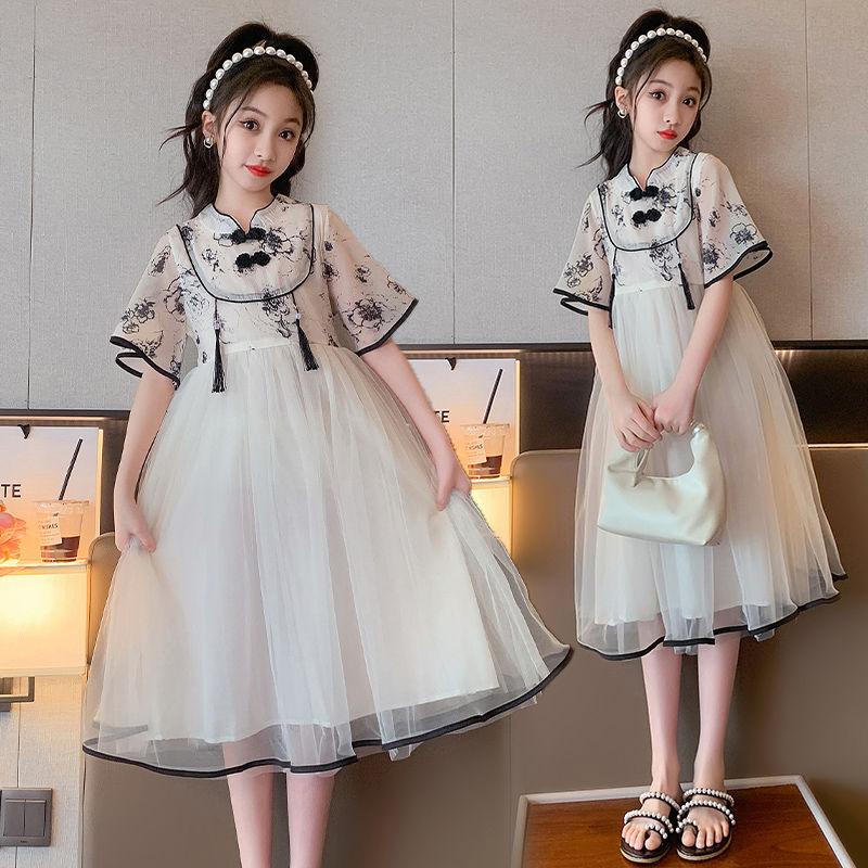 DONGSHOP Trung Quốc phong cách váy trẻ em công chúa váy cô gái mực vẽ ponpong sợi mùa hè dân tộc gió 12-15 tuổi