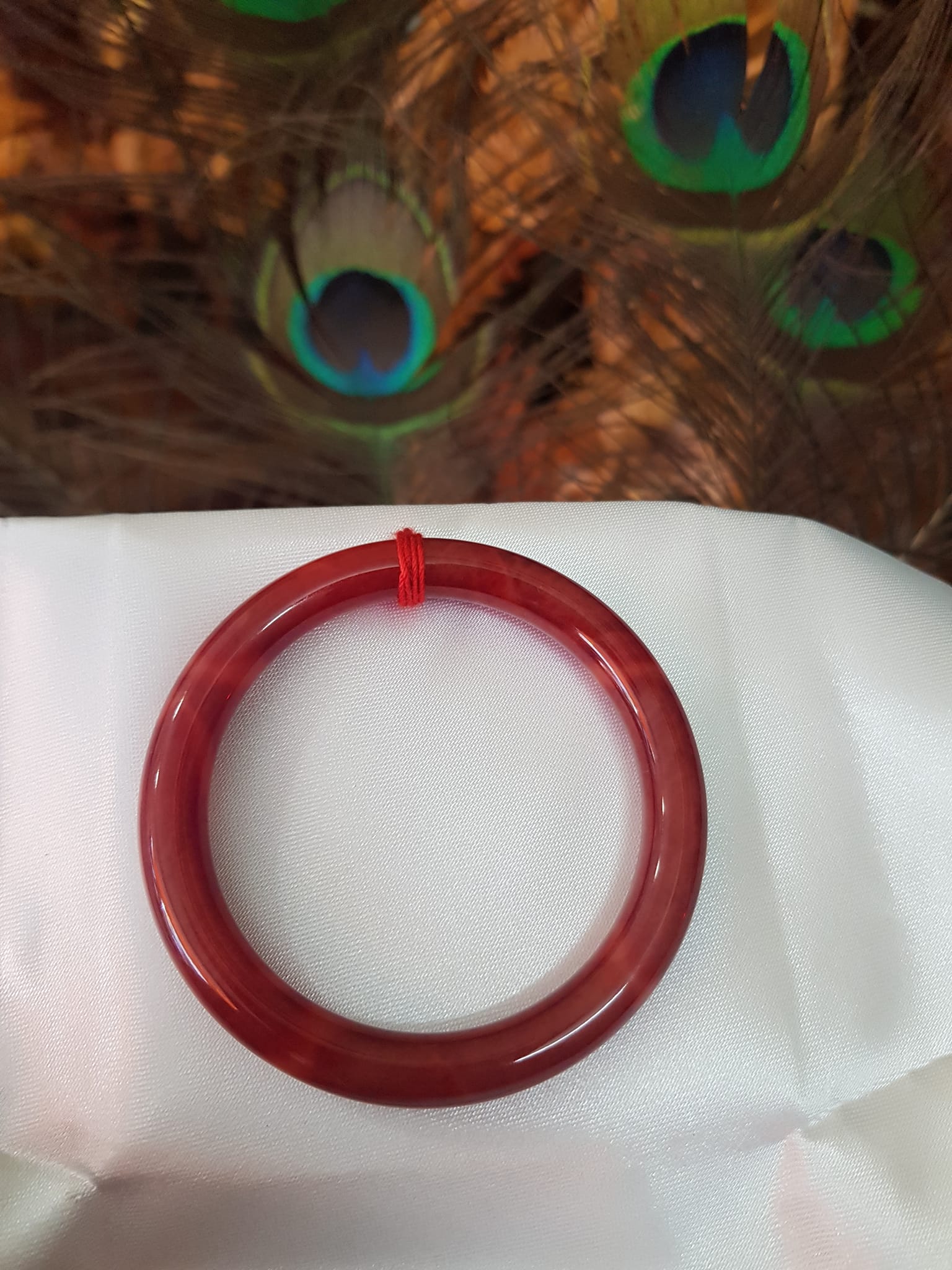 Vòng Nữ đá cẩm thạch Đỏ Đẹp 50mm x cọng 7,2mn Màu đỏ đậm vân vân đậm nhạt đều đẹp Nữ mệnh Hỏa Thổ 49kg - 54kg ạ
