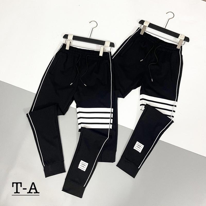 Quần Nỉ sọc 2 bên ống côn 4 sọc quanh đùi