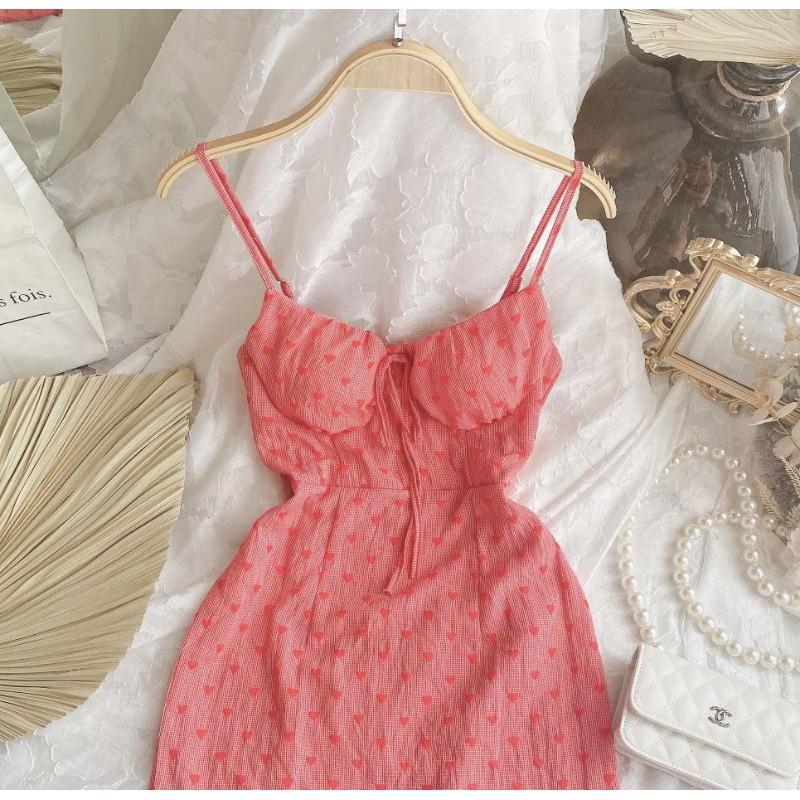 Đầm hoạ tiết tim hai dây cột nơ vai