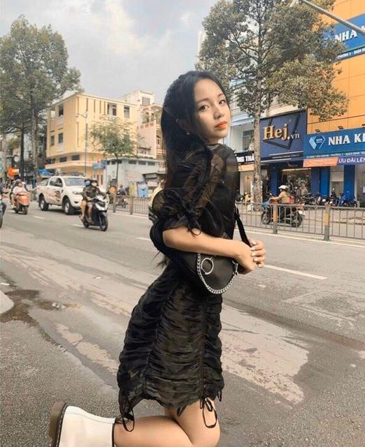 Đầm xốp đen rút thân