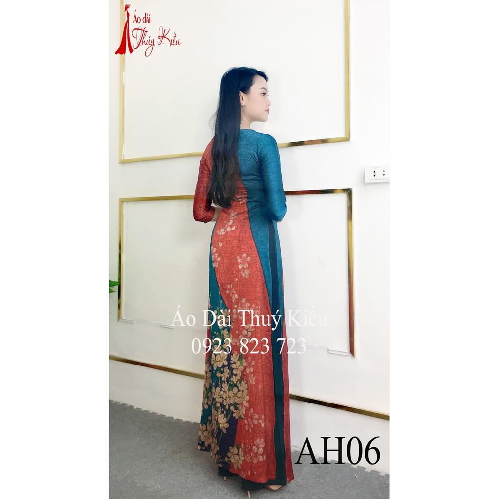 Áo dài Đông Hưng nền xanh đỏ gân chìm in hoa hồng AH06