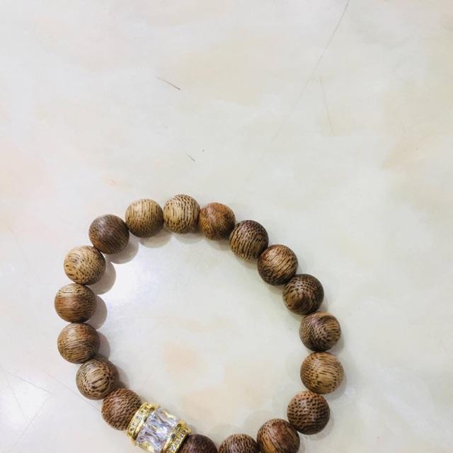 Vòng trầm hương mix charm trắng