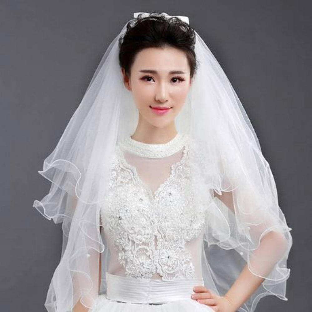 Voan Cô Dâu Cao Cấp 4 Lớp 120 số 2, Đính Nơ Tạo Kiểu, Trang Trí Hạt Trai Nổi Bật, Có Chỉ Viền Chất Liệu Mềm Mịn, Thướt Tha, Có Lược Cài Giữ Chắc Chắn Trên Tóc Khi Sử Dụng, Màu Trắng Thời Trang, Dễ Kết Hợp Với Các KiểuTrang Phục Cưới Hoặc Tham Gia Sự Kiện, Chụp Ảnh, Cài Tóc Đẹp Tạo Phong Cách Tự Tin, Thướt Tha, Quyến Rũ, Tôn Lên Các Nét Đẹp, Che Đi Khuyết Điểm