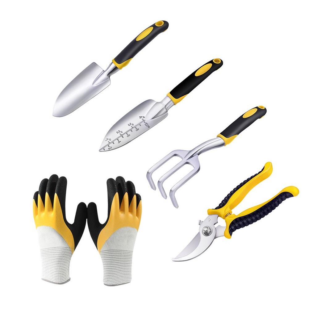 Đặt với 5 công cụ làm vườn, bao gồm thuổng, trowels, vòng tròn, kéo vườn và găng tay vườn