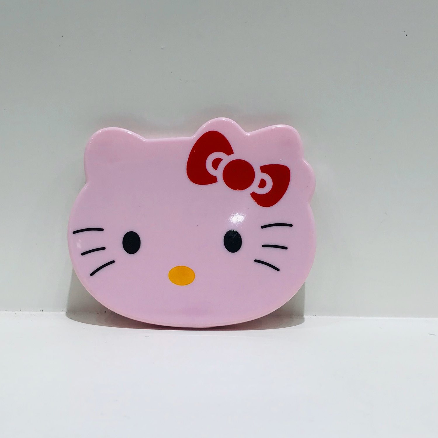 Gương kèm lược đầu Hello Kitty