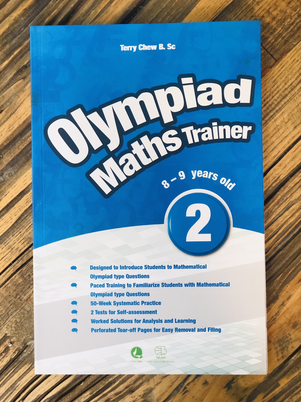 Sách Olympiad Maths Trainer 2 - Cuốn Sách Bài Tập Bổ Trợ Toán Học Lớp 2 - Á Châu Books, Bìa Mềm, In Màu
