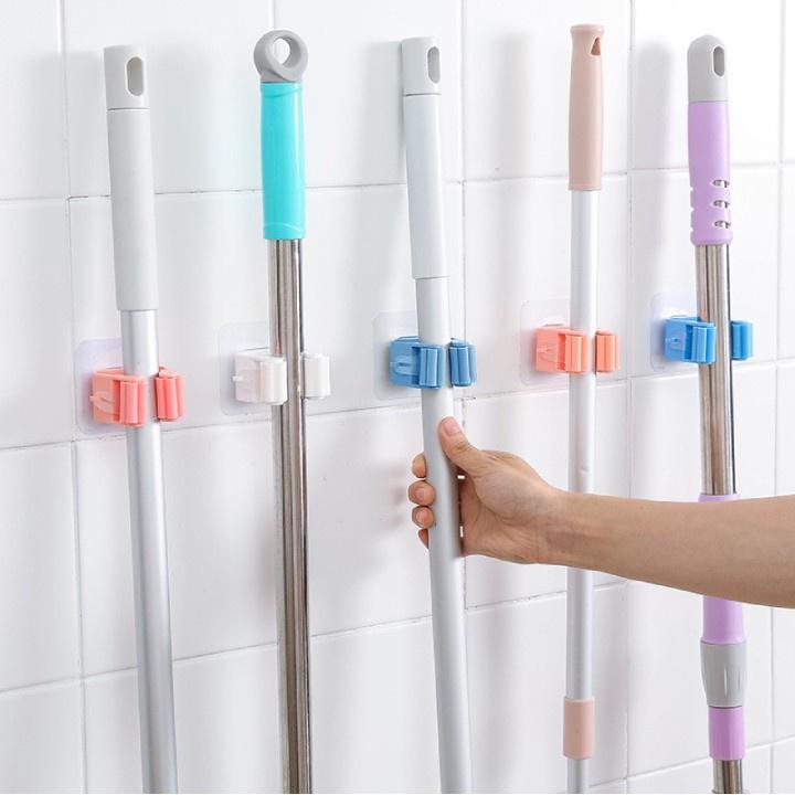 Sỉ 50 Móc Kẹp Đồ Vật Dán Tường Treo Tường Chổi Treo Quần Áo Treo Vật Dụng H003