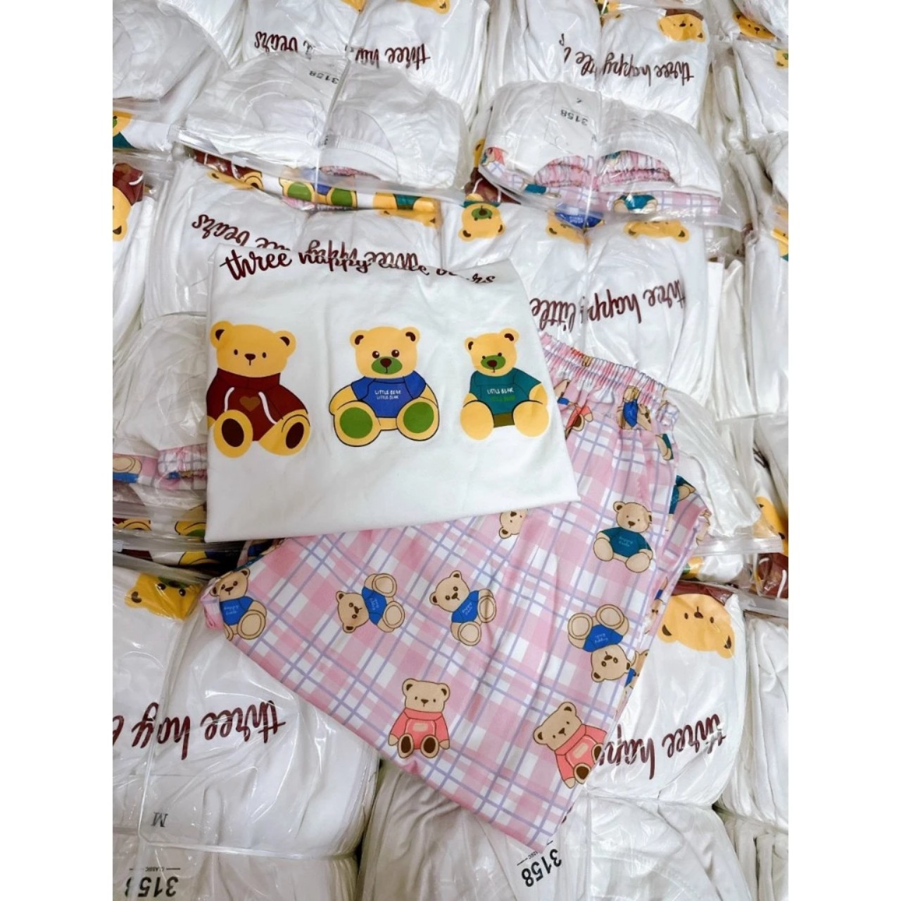 Bộ pijama quần tay quảng châu hoạ tiết đáng yêu bo viền chắc chắn