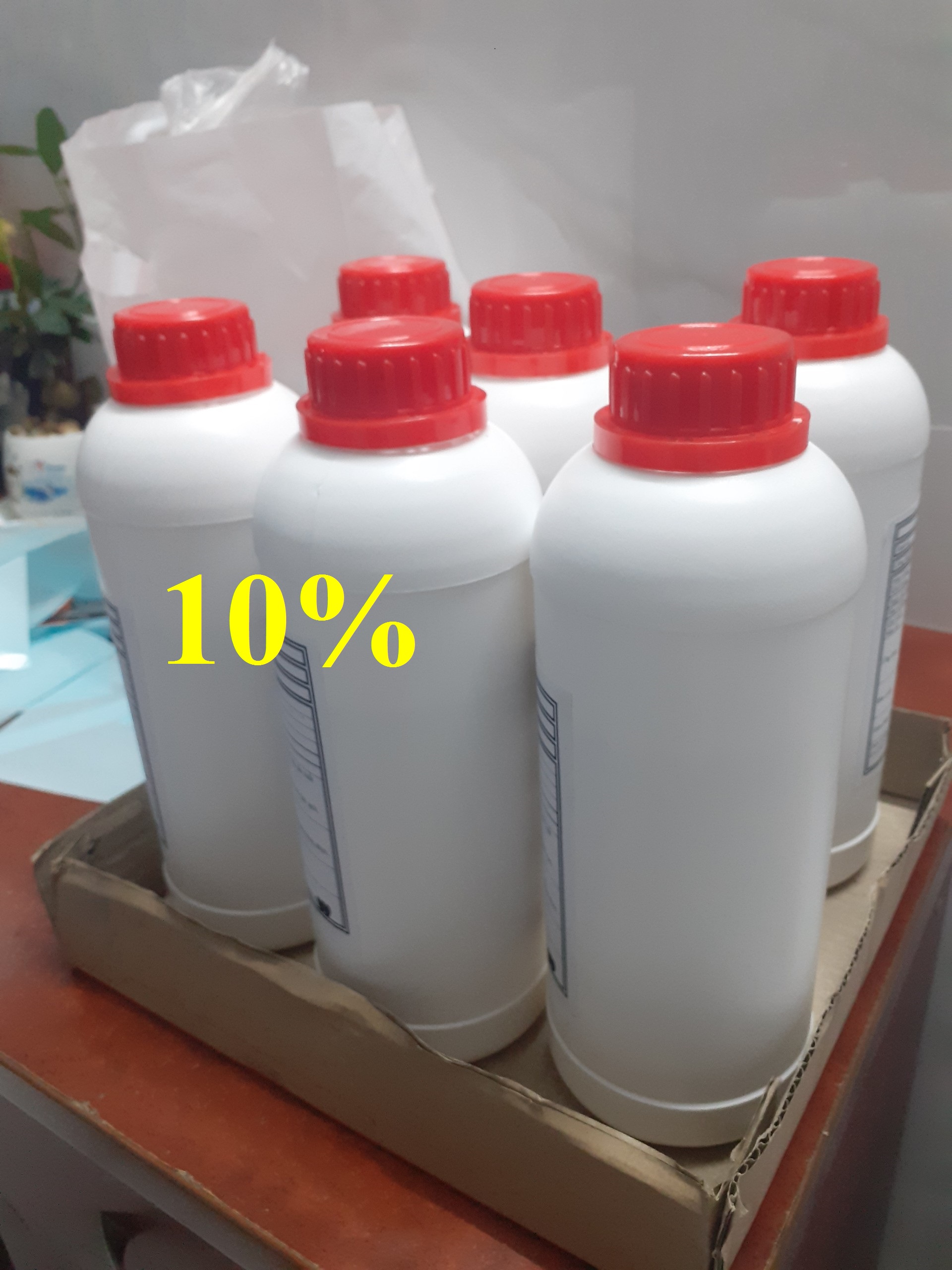 Chai 1 lít javel 10% tẩy trắng quần áo, khử khuẩn, lau sàn.