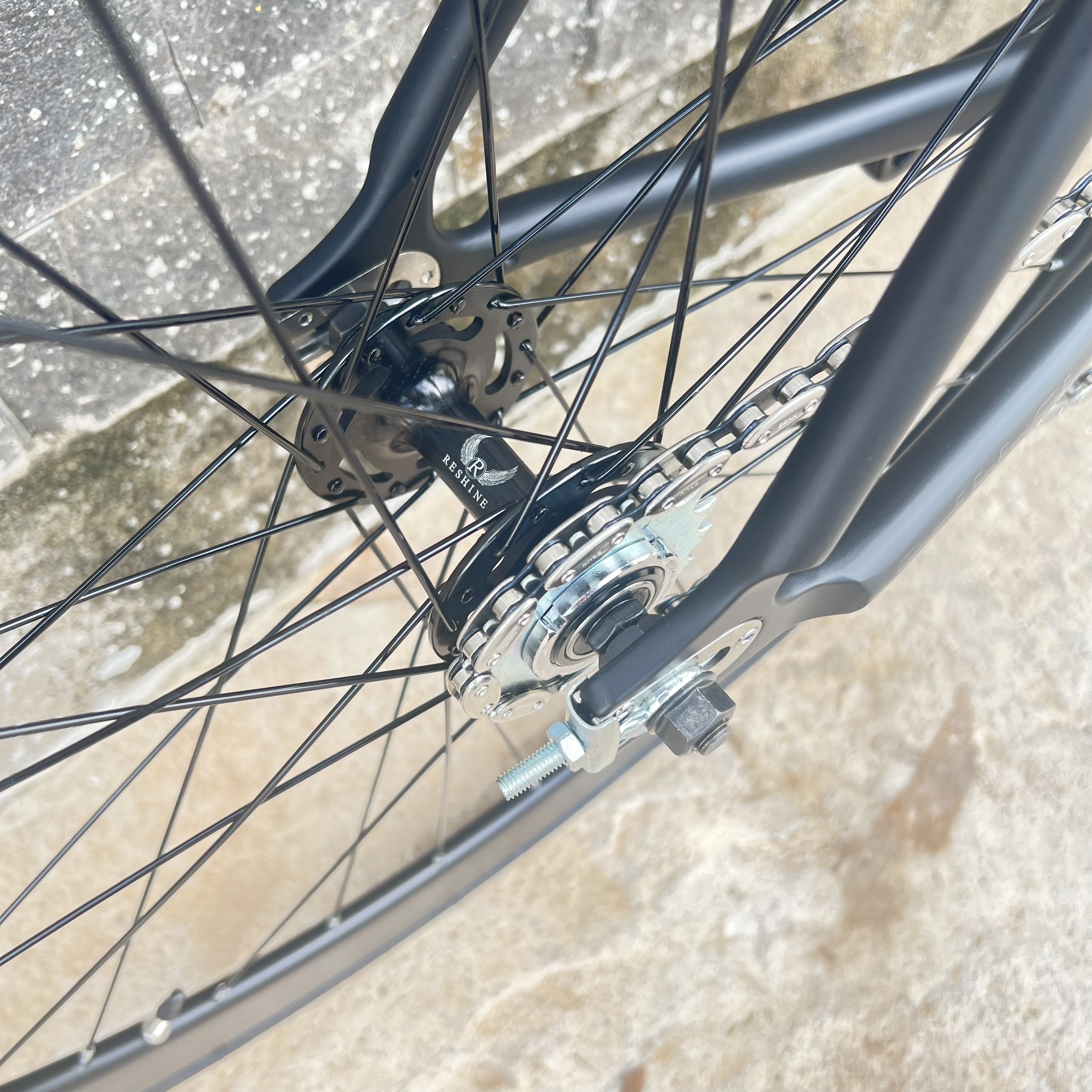 Xe đạp fixed gear TSUNAMI SNM100 nâng cao - Đen nhám chữ đen
