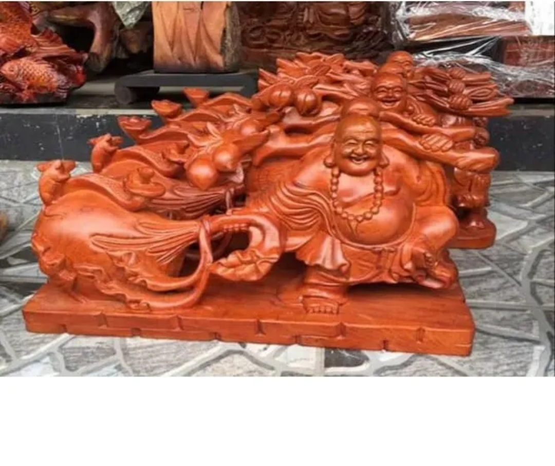 Tượng phật di lặc kéo bao tiền gỗ hương ngang 46 cm