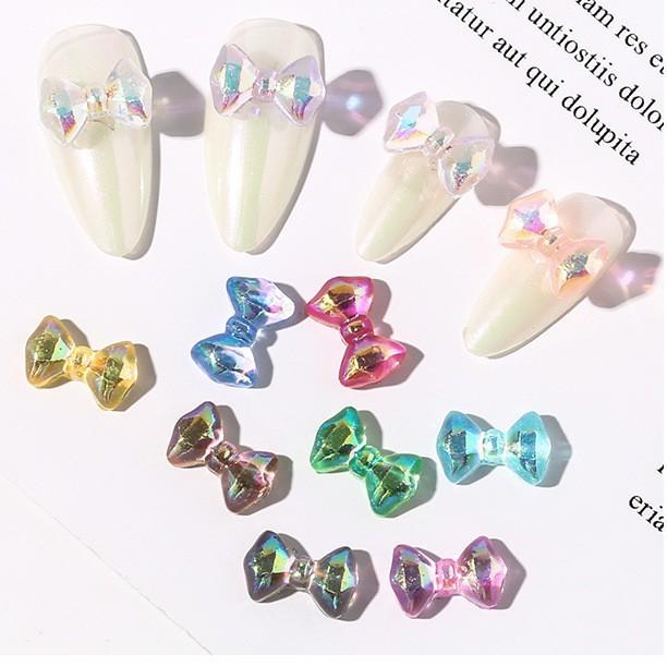 Charm nơ tráng gương cầu vòng đính móng BYH004