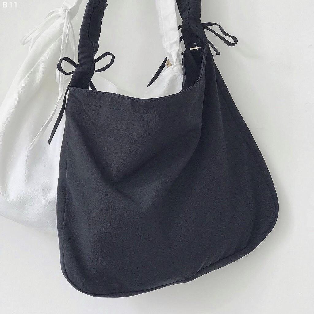 Túi xoắn dây. đeo chéo,tote đi học hàng Ulzzang, 2 màu Đen Trắng vải Kaki mềm, dây rút điều chỉnh