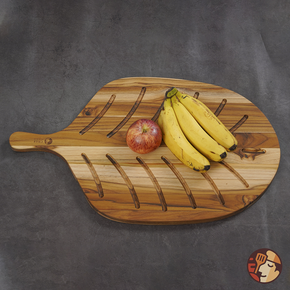 Thớt gỗ Teak Chef Studio cao cấp hình chiếc lá, kích thước 55x35x1.9 cm, dùng cho cắt thái và trang trí