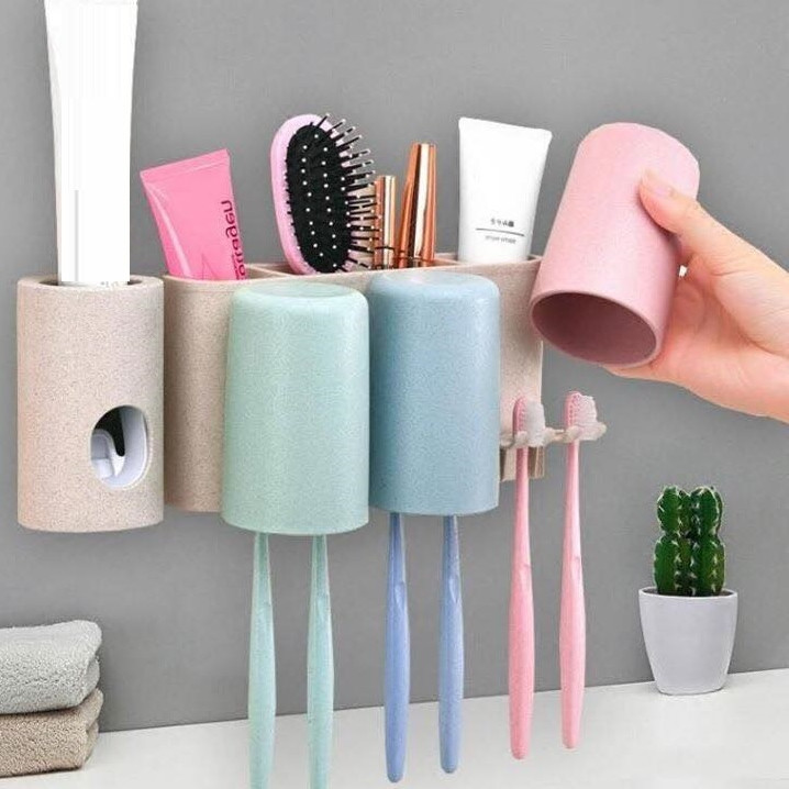 Dụng cụ lấy kem kèm treo bàn chải