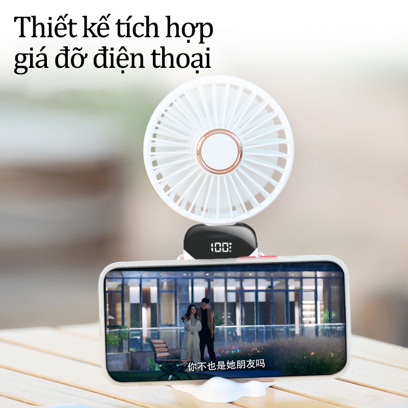 Quạt Cầm Tay Mini Tích Điện Có Đế Để Bàn Kiêm Giá Đỡ Điện Thoại Pin Trâu 6000mAh Phù Hợp Cho Mẹ Và Bé Đi Dạo Quạt Mini Điều Hòa 5 Cấp Độ Màn Hình LCD Hiển Thị Pin Nhỏ Gọn Có Dây Đeo Cổ Tặng Kèm Dây Và Viên Thơm