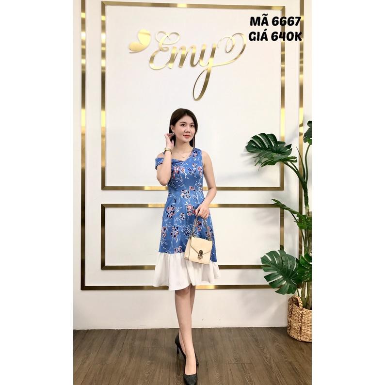 Đầm EMY EM6667 Xòe Midi Sát Nách Nền Xanh Hoạ TIết