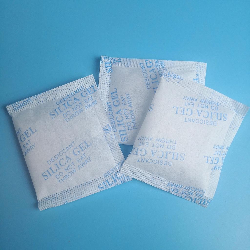 Gói hút ẩm tủ quần áo hạt hút ấm thực phẩm máy ảnh cho giày túi xách Silica Gel các loại gói 500 gr