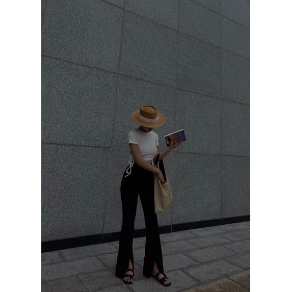 Jeans loe đen xẻ lai