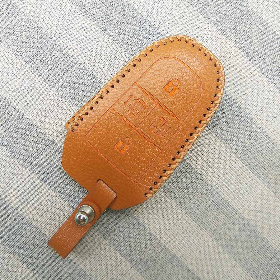 Bao da 4 nút chìa khóa smartkey cho xe hơi Peugeot Traveller
