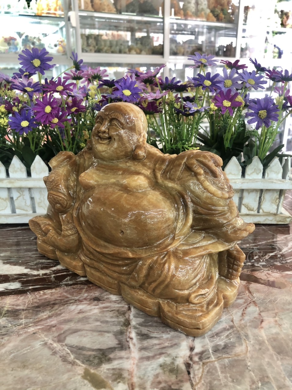 Tượng phật Di Lặc ngồi trên thỏi vàng phong thủy đá cẩm thạch vân gỗ - Dài 22 cm