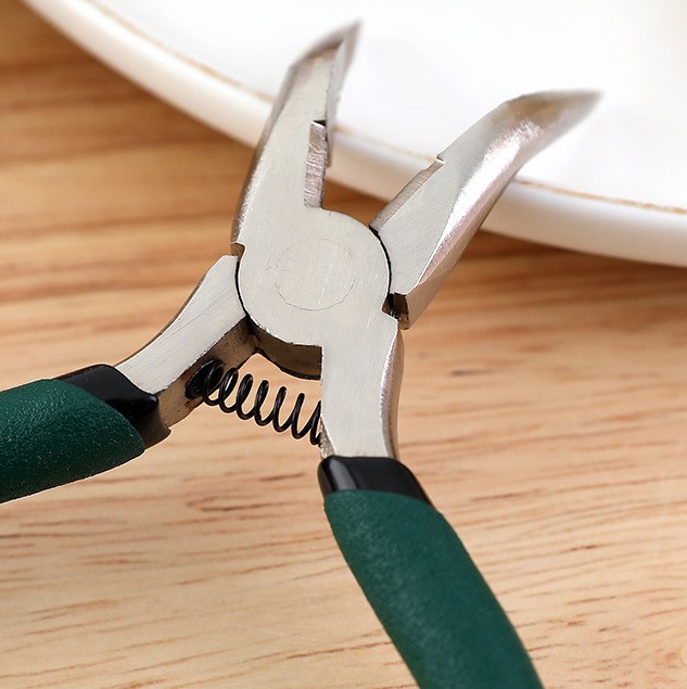 Dụng Cụ Rút Xương Chân Gà