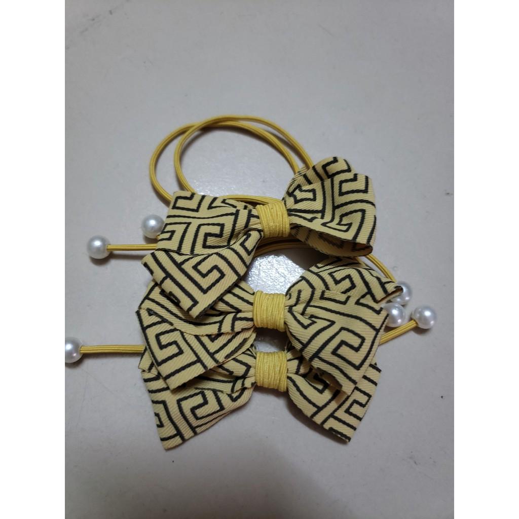 Dây cột tóc nơ dễ thương,nhiều màu cho các nàng chọ lựa