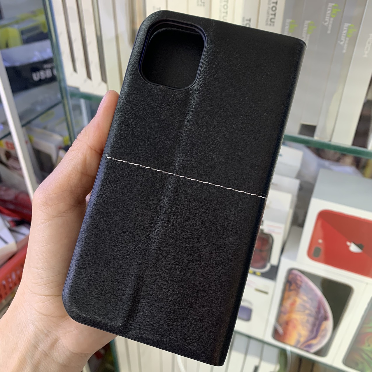 Bao da iPhone 11 Pro Max NUOKU Royal ngăn chứa - Hàng chính hãng