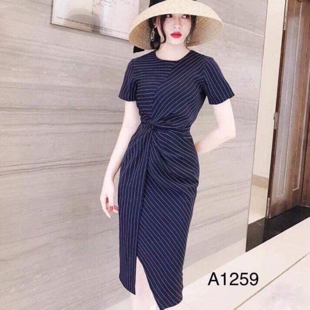 Đầm thiết kế xoắn eo lệch tà