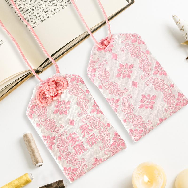 Túi gấm Omamori an khang vĩnh bảo hồng trắng có kèm túi chống nước Túi Phước May Mắn dây treo trang trí