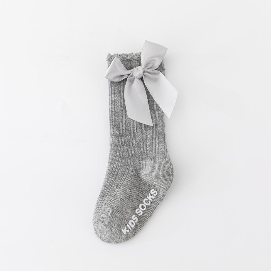 Một đôi tất ,vớ cotton dài mềm mại chống trượt đến đầu gối phối ren thắt nơ công chúa cho bé gái mẫu cực hót năm 2022