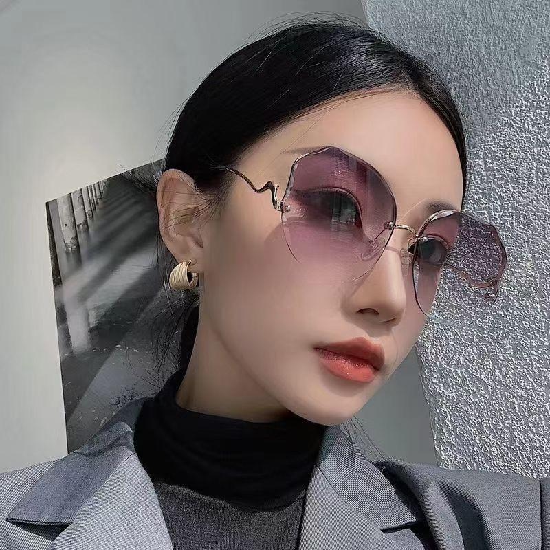 Kính mát kính râm thời trang gọng tròn cao cấp dành cho nữ