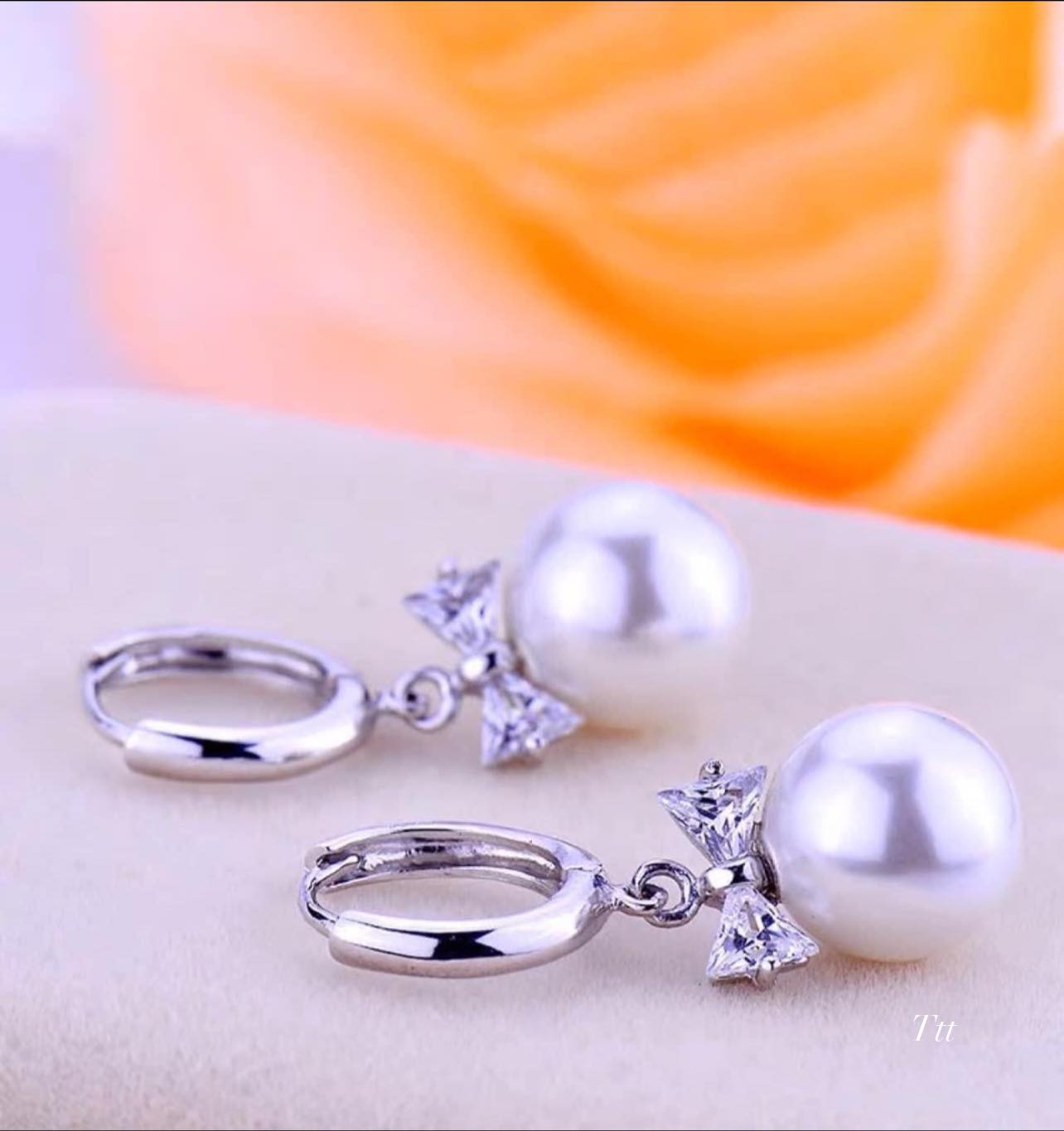 Bông tai bạc khuyên tròn nơ trai chất liệu bạc s925 MS065d