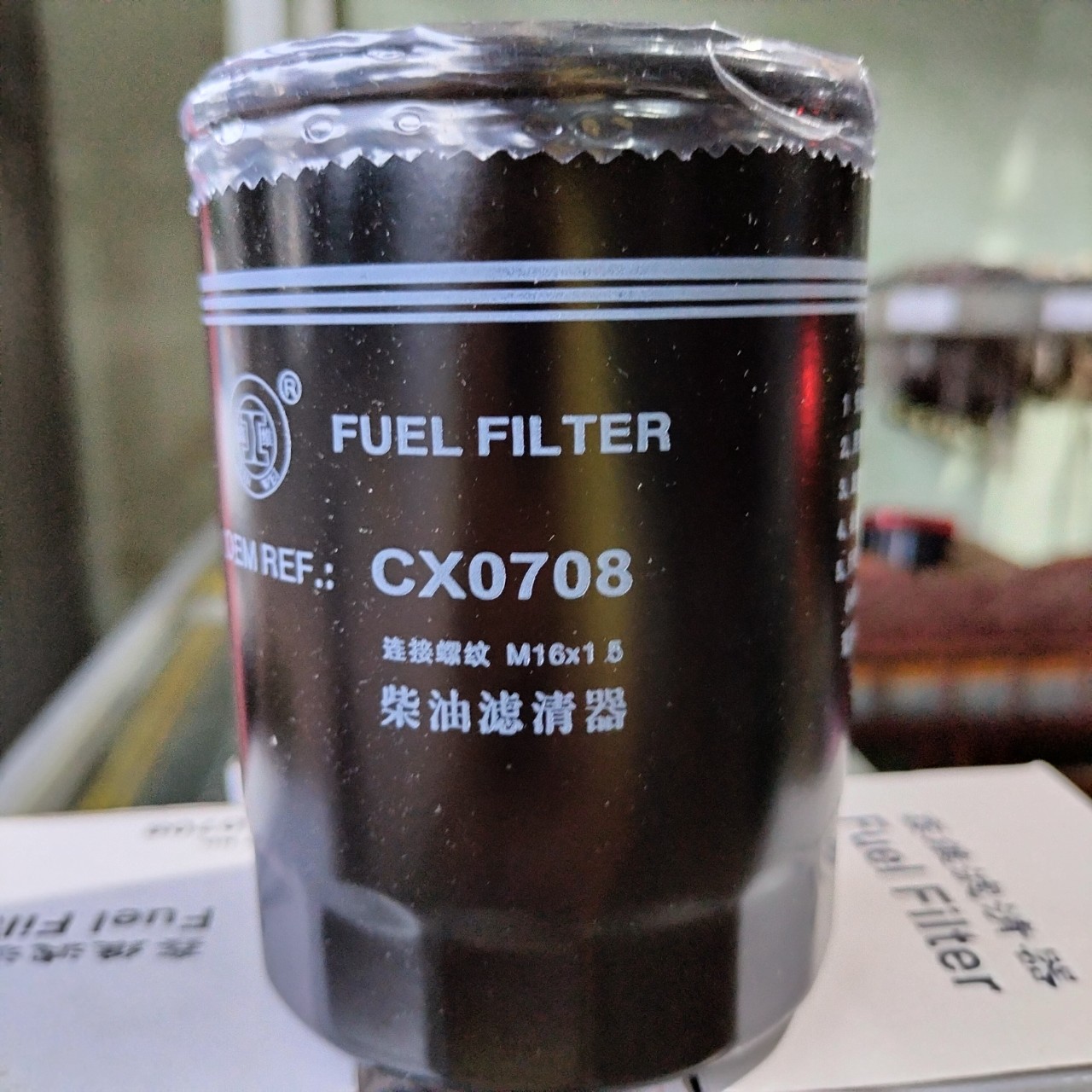Lọc nhiên liệu (Lọc dầu) xe Foton 1.5 tấn, Vinaxuki , mã lọc CX0708. Lỗ ren 15mm, Đường kính 81mm, cao 100mm