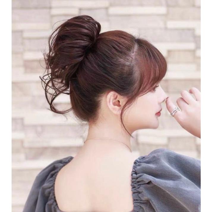 Tóc giả búi cột rớt đây