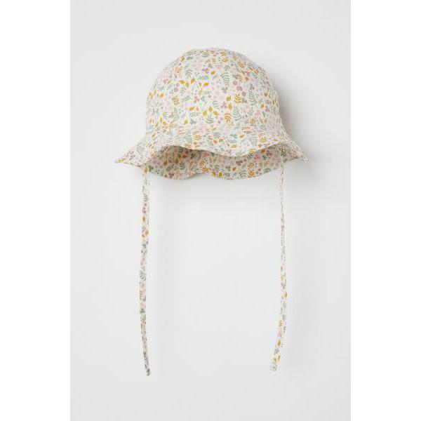 Mũ tai bèo in họa tiết lá vàng, Hờ mờ