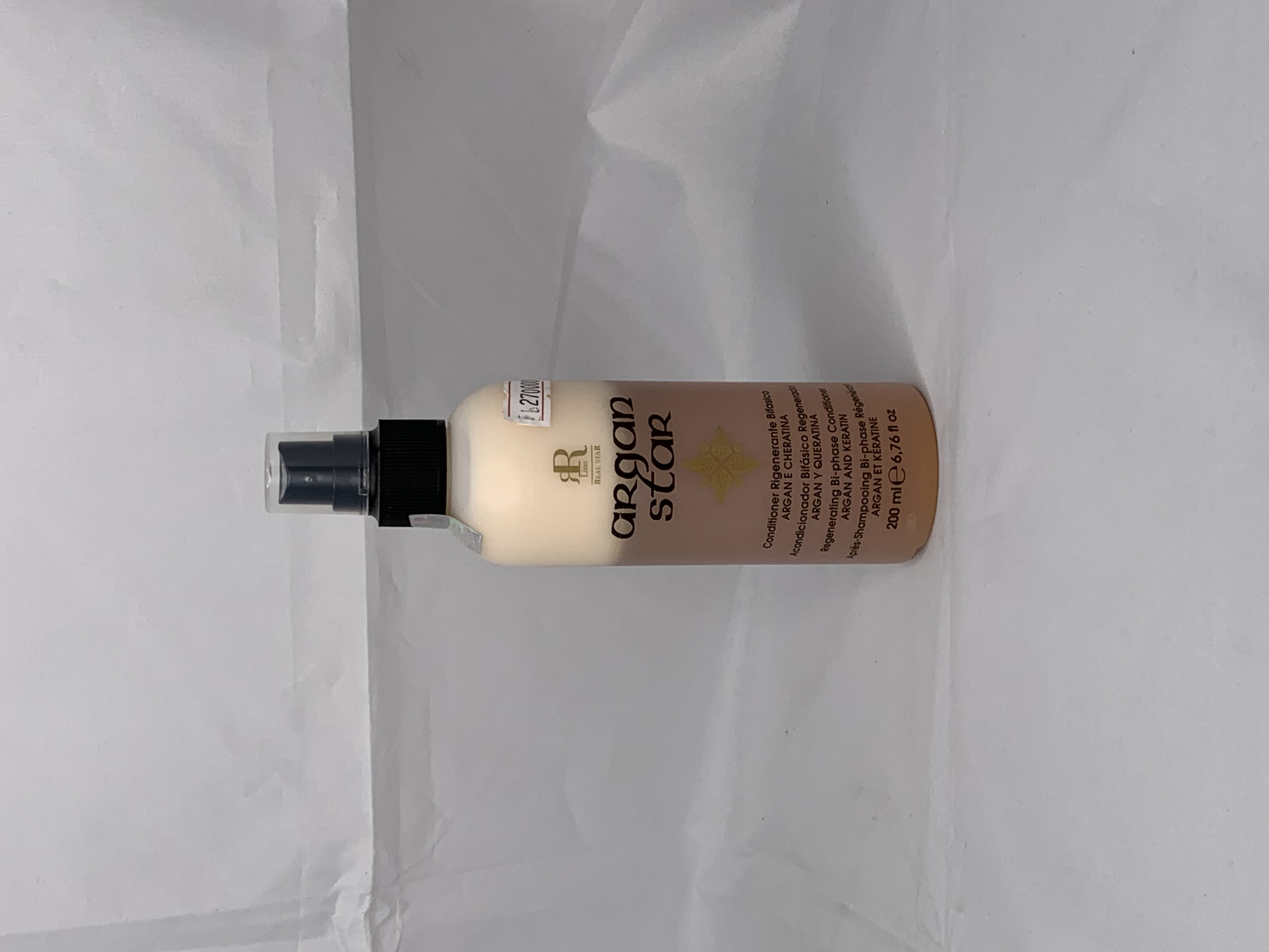 Xịt dưỡng 2 lớp phục hồi tóc Rrline Argan Leave in Conditioner 200ml