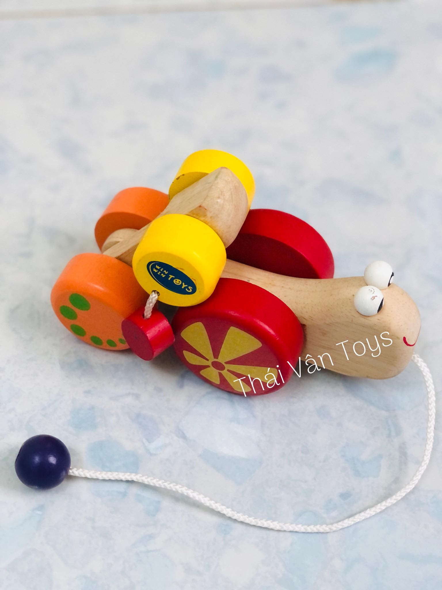 Đồ chơi gỗ hình chú ốc sên giúp bé vận động - Ốc sên vui vẻ