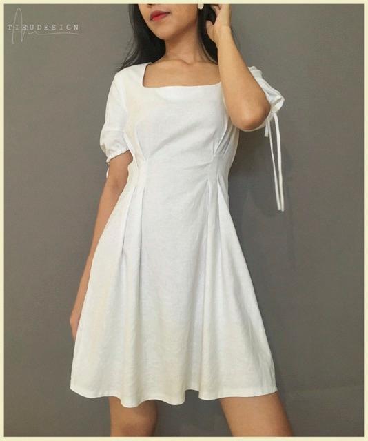 Đầm trắng cổ chữ U tay nơ