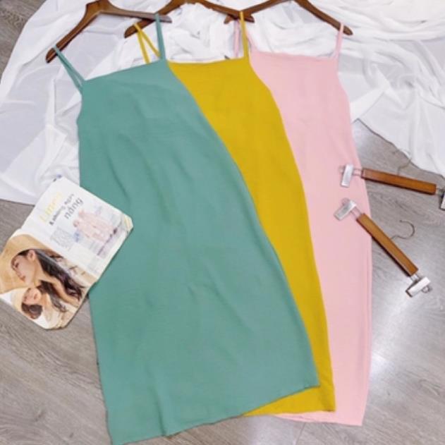 Váy 2 dây trơn đi biển hở lưng thắt nơ chất đũi nhiều màu