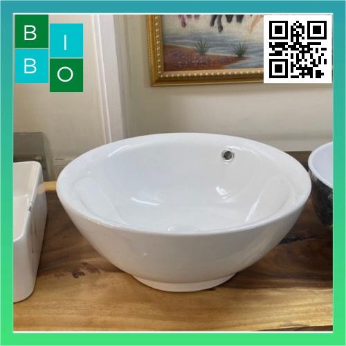 Lavabo tròn đặt bàn màu trắng