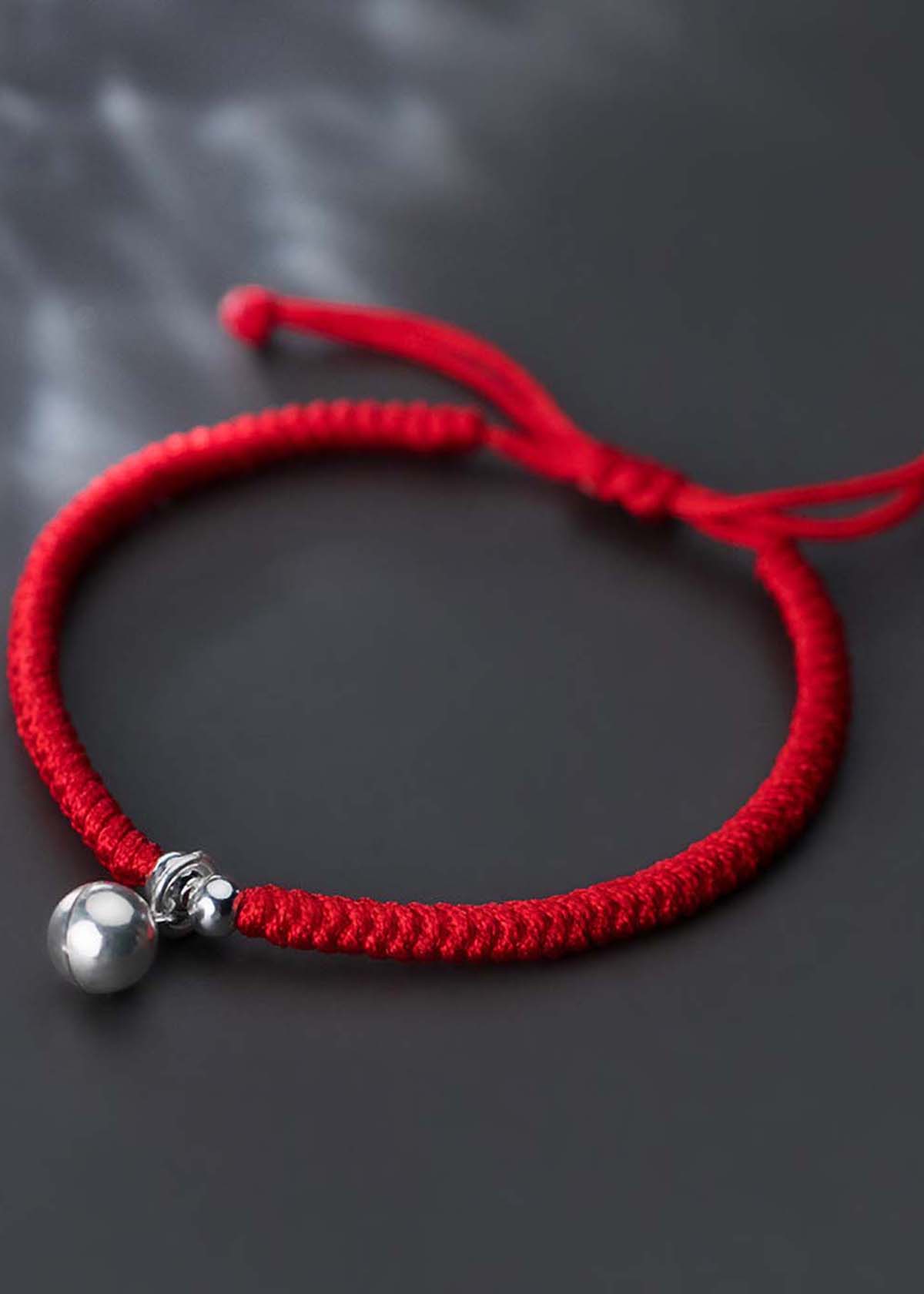 Combo 2 vòng thắt dây đỏ charm chuông - Ngọc Quý Gemstones