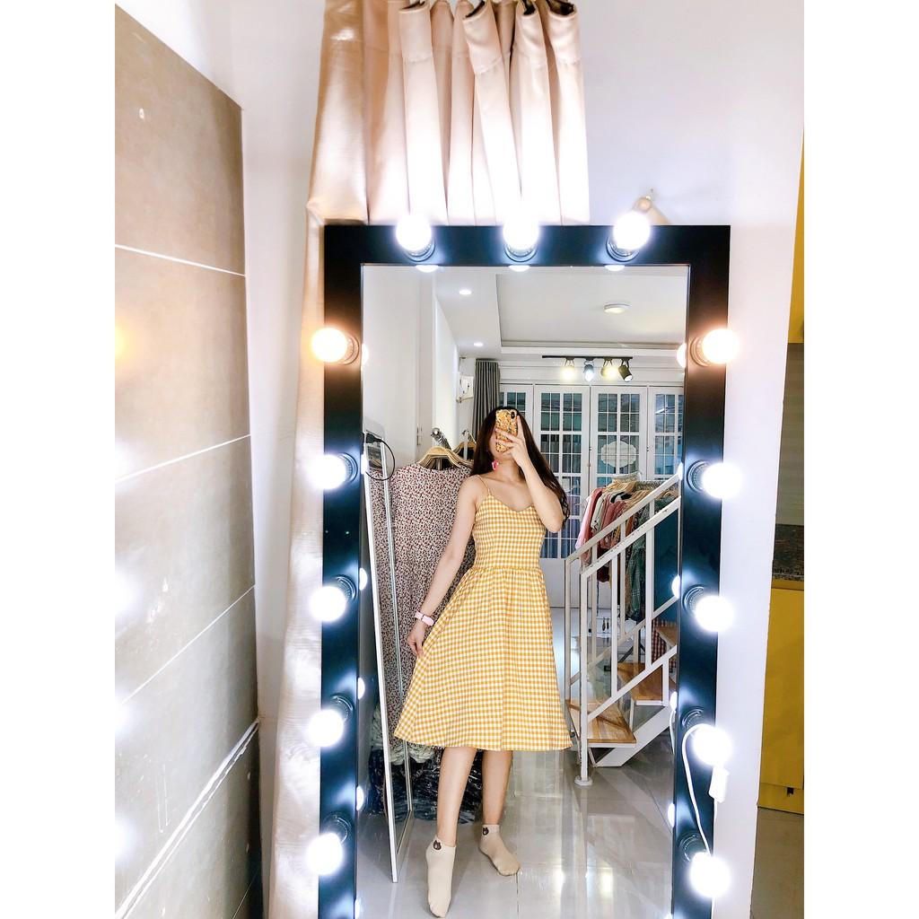 Đầm caro hai dây xòe