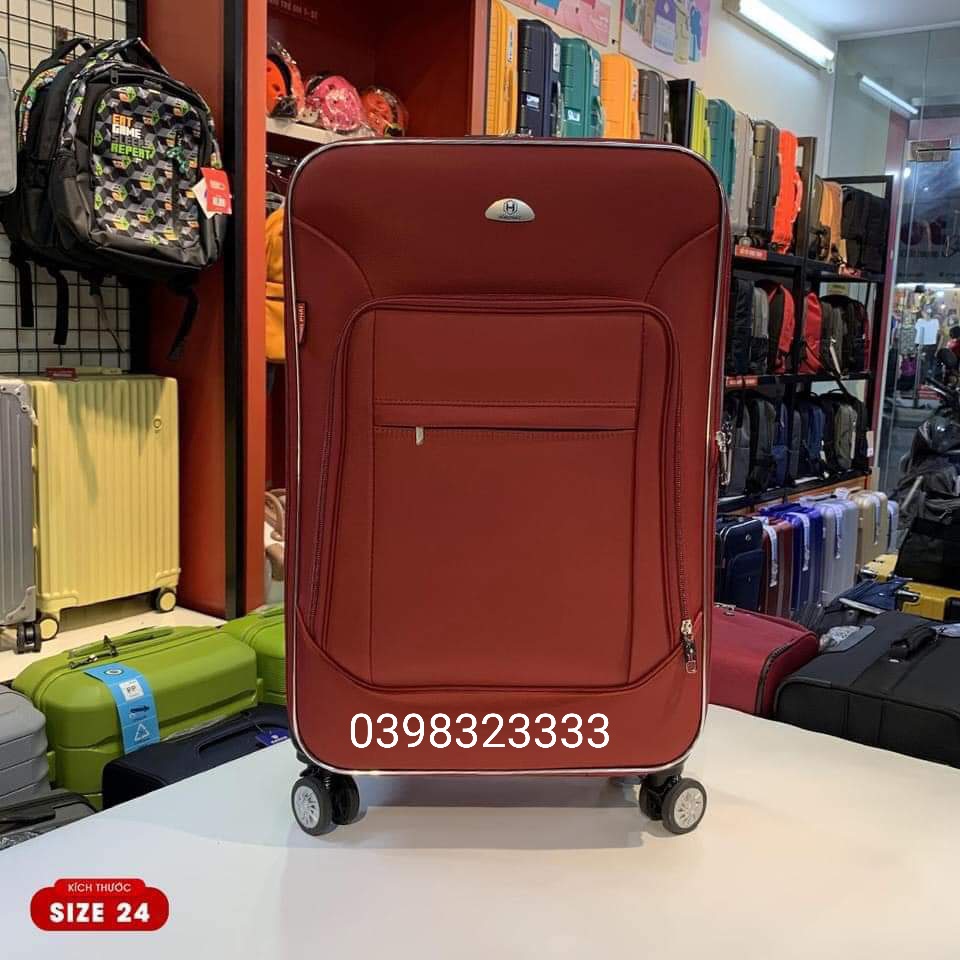 Vali vải hùng phát size 28 màu đỏ
